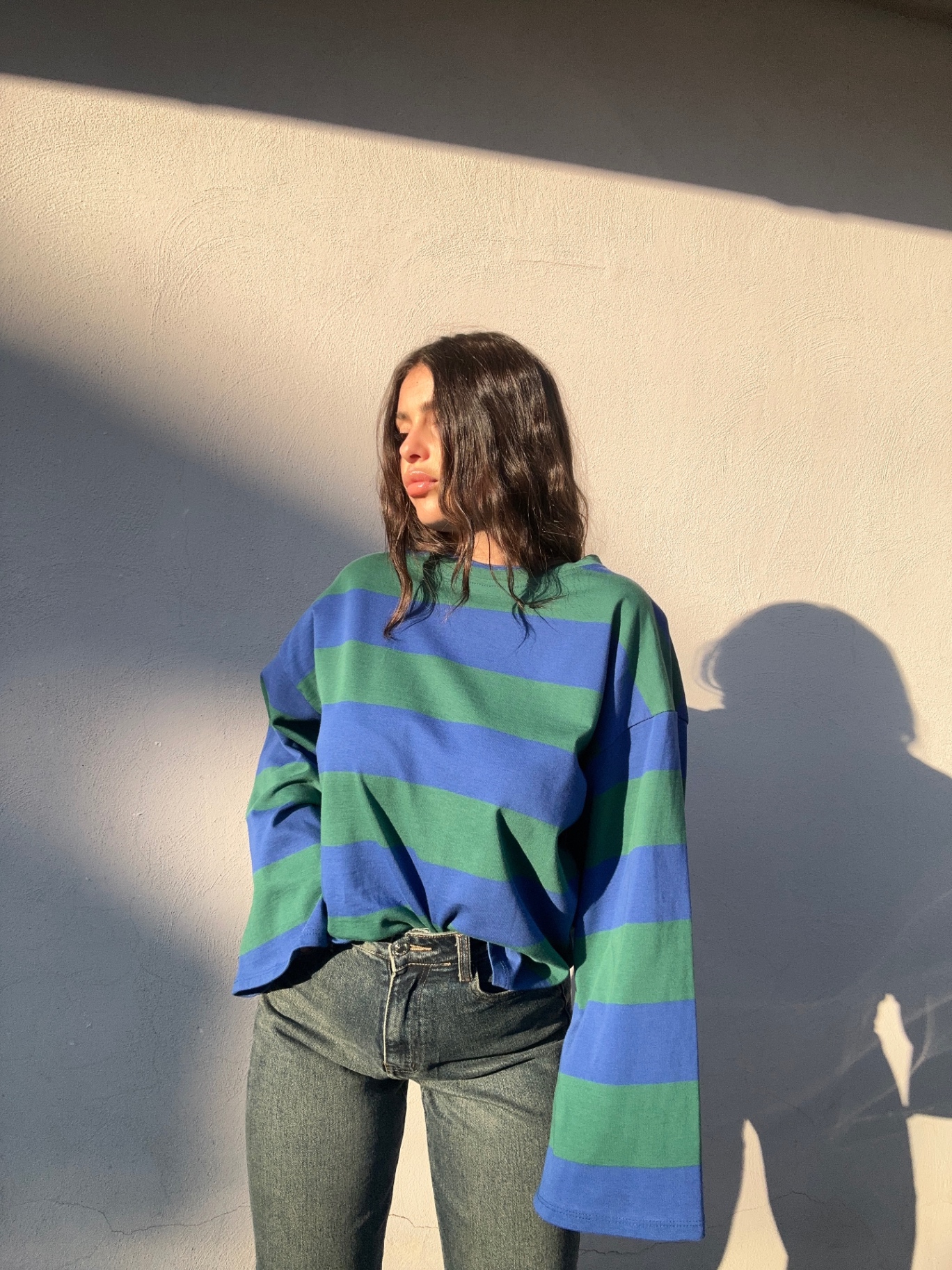 Maglia oversize a righe con maniche svasate