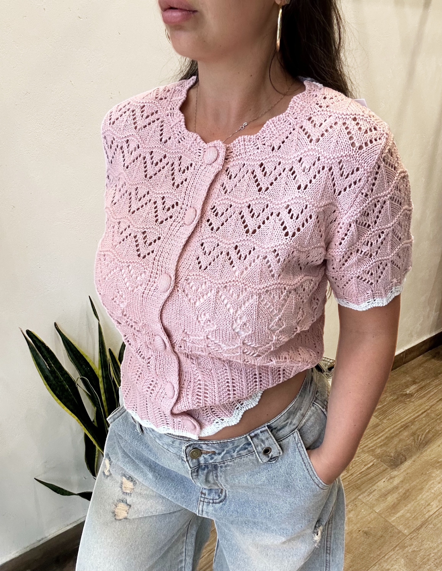 Cardigan traforato bottoni rosa